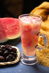 Es Buah is a fresh fruit drink made from shavings of melon, cantaloupe, young coconut, and sliced watermelon. Ramadan takjil. Indonesian food. Indonesian Drinks. Ramadan dishes. Kurma Ajwah.