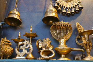 Fototapeta na wymiar Bronze religious souvenirs in Rishikesh.