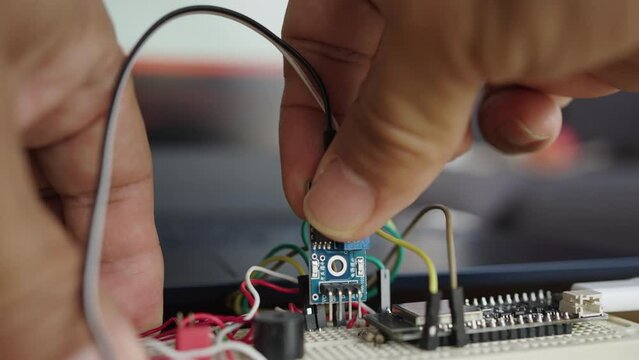 Programming and connecting various devices of the Arduino microcontroller board to measure soil moisture for agriculture. Internet of Things.