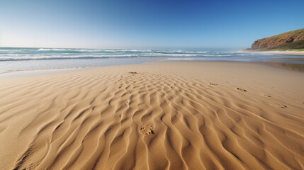 Fototapeta na wymiar sandy beach near the ocean under a clear blue sky. Generative Ai