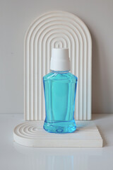 mouthwash liquid in a container on table 