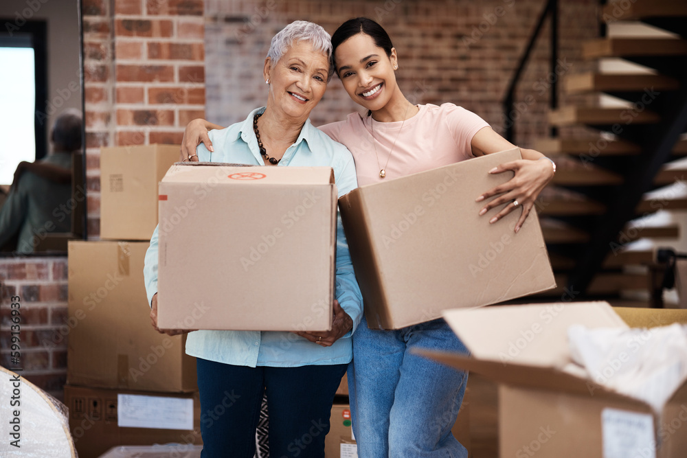 Sticker time to fill a new home with memories. a senior woman moving house with help from her daughter.