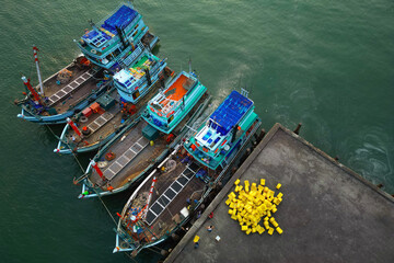 Fototapeta na wymiar asian fisherman boat ,docks at the harbor