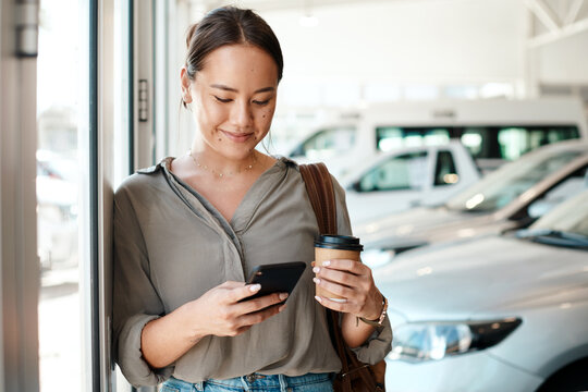 Phone, coffee and woman at a car dealership typing a text message or scrolling on social media. Communication, technology and female person browsing on a mobile app with a cellphone in a showroom.
