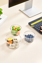 Various vegetables and fruits in glass crisper, indoor kitchen scene, healthy lifestyle