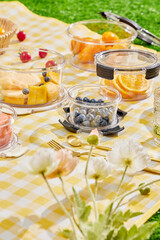 Various vegetables and fruits in glass crisper, outdoor grass camping scene, healthy lifestyle