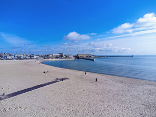 Aerial view landscape. Urban beach in Poland, Gdynia. Photo from a drone. View of the harbor and...