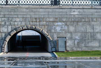 Pedestrian crossing under the bridge. Tunnel under the road.