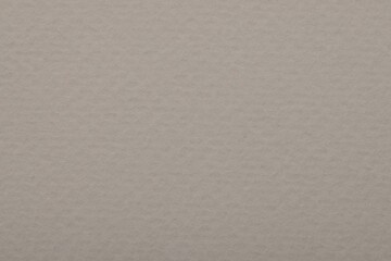 Texture of light grey paper sheet as background, top view
