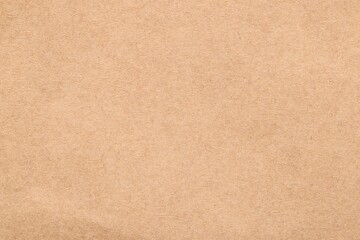 Texture of beige paper sheet as background, top view