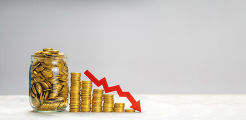 Drop graph and red arrow down. A symbol of failure and unsuccessful investments and bad savings