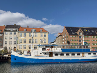 Naklejka premium Old boats -Walking along Copenhagen's canals on a beautiful spring day, Denmark, Europe