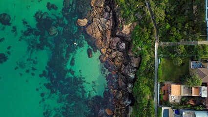Rocky coast line against sea