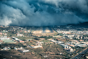 Obraz premium Airport runway partially covered by clouds. Los Rodeos, Tenerife