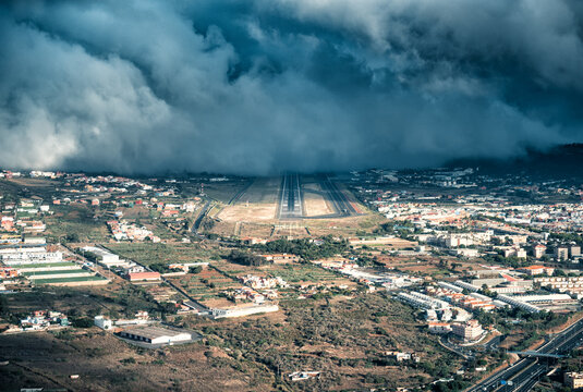 Airport runway partially covered by clouds. Los Rodeos, Tenerife