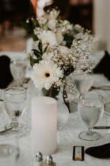 White florals on dinner reception table