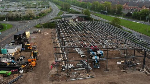 Aerial view of Aldi retailer building site foundation steel framework and construction equipment