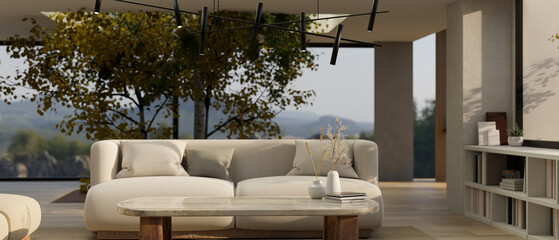 Fototapeta premium Copy space on a coffee table in a modern contemporary living room with indoor tree