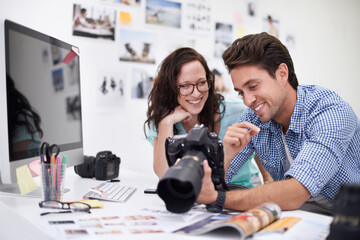 Happy photographers, smile and camera at office for photo, memory or teamwork at the studio. Man and woman in team photography smiling for digital advertising, marketing or photos at the workplace