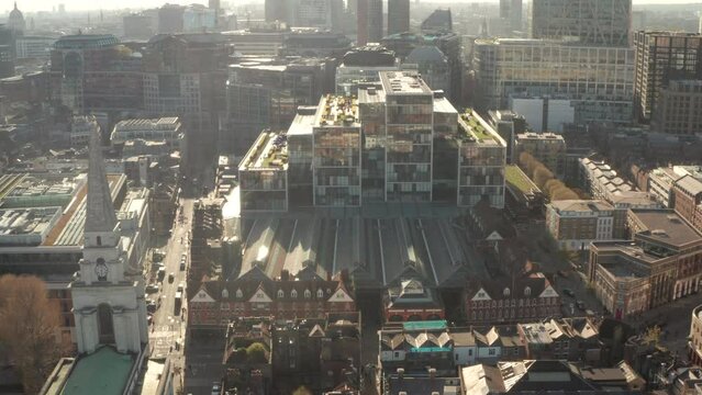 Circling aerial shot around Old Spitalfields market Central London