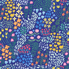 A pattern of abstract bright spring and summer flowers on a blue background.