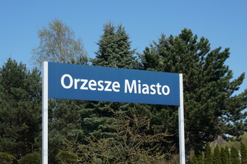 Fototapeta premium Railway station name signboard on platform. Orzesze, Poland.