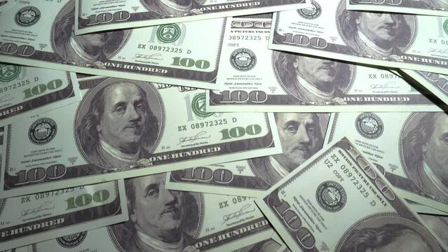 US American Dollar Bills Money - Camera flying Close up over stacked &ndash; $100 Banknotes