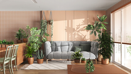 Urban jungle, kitchen and living room in white and orange tones. Dining table, parquet floor and houseplants. Home garden interior design. Love for plants concept