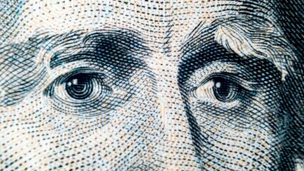 Portraits of the faces of American presidents on 1, 5, 10, 50, 100 bills. Stop motion animation. USD cash macro view. Eyes macro shot