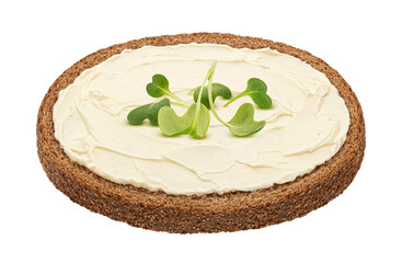 Slice of rye bread with smeared butter isolated on white background