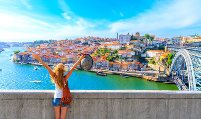 Happy traveler woman in Porto- Cityscape panoramic view of Porto- Portugal