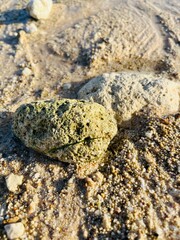 Rock Focus and Sand on the beach 