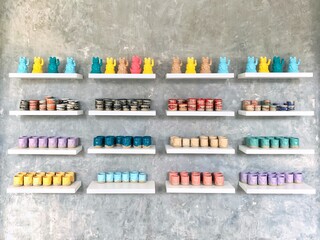 Colorful cans of paint on the wall