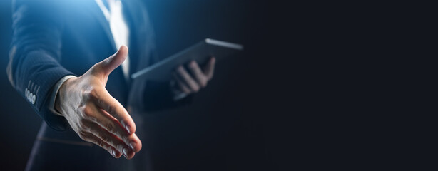 Businessman extends his hand for a handshake. Concept of a successful deal or contract. Copyspace