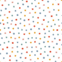 Seamless pattern with colorful tiny flowers