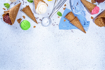 Colorful ice cream in waffle cones