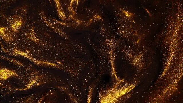 Golden paint mixed with water on black background