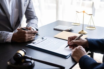 Businessmen and lawyers meeting to discuss contract documents sitting at table Legal concept. Advice. Injustice legal service in a lawyer office.