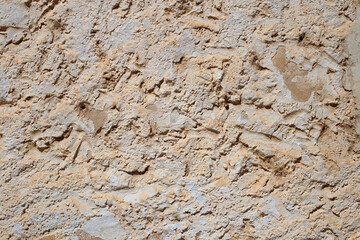 textura de la pared vieja recubierta con cal y cemento, con grietas