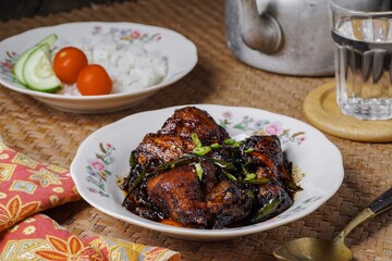 Delicious chicken soy sauce. Malaysian people called Ayam Masak Kicap on a plate