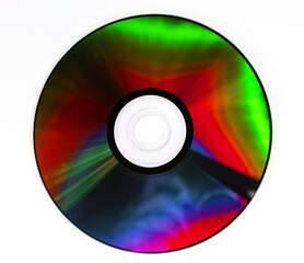 CD DVD compact optical disk storage medium with dust and scratches. Rainbow spectrum of iridescent colors