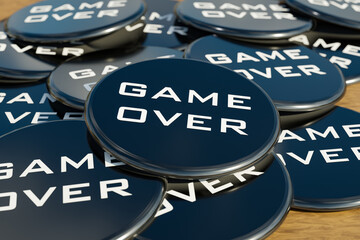 Game Over badge. Black badges laying on the table with the message "Game Over". Leisure activity, final game, challenge, video games, strategy and leisure games. 3D illustration