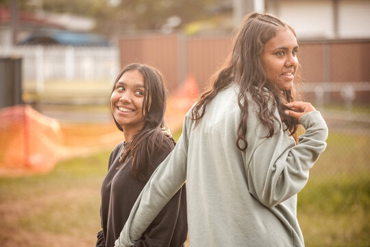 Two Aboriginal girls together outside