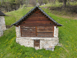 Drone view at a rural house Leontica on Blenio velley, Switzerland