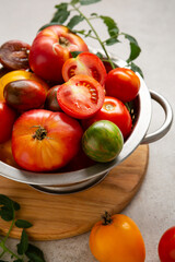 Heirloom organic tomatoes closeup harvest concept