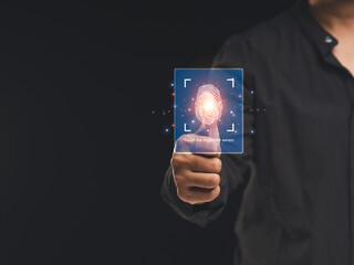 Log in to the system with a fingerprint on the virtual screen while standing on a black background