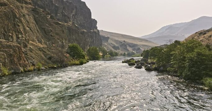 Deschutes River Oregon Aerial v84 flyover above the upper Deschutes river capturing beautiful nature landscape with rocky canyon walls and fast moving water - Shot with Mavic 3 Cine - August 2022