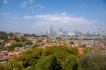 GULANGYU, XIAMEN, CHINA. February 21st, 2021: Xiamen panoramic scenery, aerial view from gulangyu island. Blue sky with copy space for text