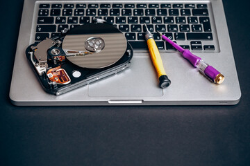 Computer disassembled HDD hard drive data disc SSD, backup part of the PC or laptop. Recovery,...