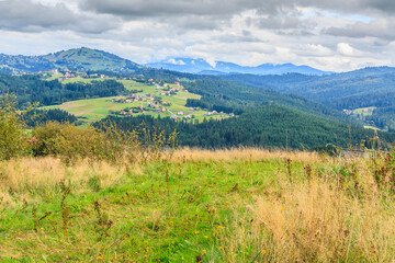 Ochodzita in Koniaków in the Silesian Beskids (Poland) seen from the vicinity of the village of Jaworzynka on a cloudy summer day.